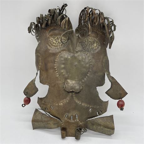 Old Punched and Bent Metal Tribal Mask Style Wall Hanging