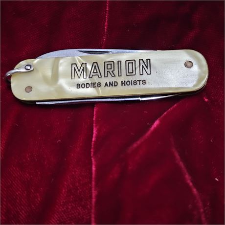 Collectible pocket knife advertising a trucking company "MARION bodies and ho
