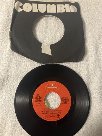 45 vinyl single record of "Let It Ride" by Bachman-Turner Overdrive.  Artis