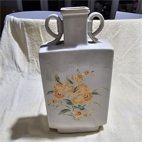 Decorative porcelain vase with a floral pattern, possibly a vintage or oriental-