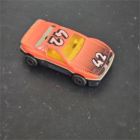 Vntage Majorette die-cast toy car, specifically a Pontiac Fiero, model number 2