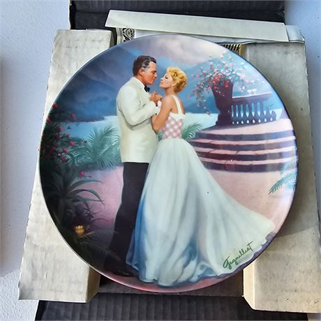 collector plate titled "Some Enchanted Evening". It is the first issue in the S