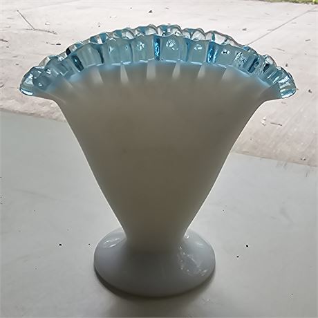 Fenton milk glass fan vase with a aqua blue ruffled ribbon edge. It's 4.25 inche