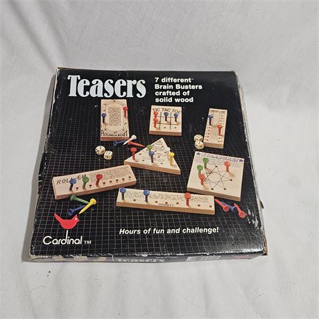 Teasers: 7 different Brain Busters crafted of solid wood" game set by Cardinal.