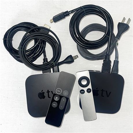 Two Apple TV Media Streamers with Remotes