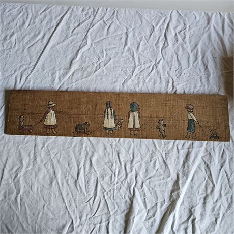 Rectangular piece of folk art, possibly a wall hanging or decorative plaque,