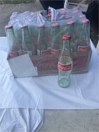 Case of glass Coca-Cola bottles,