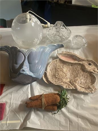 collection of home decor items, including a ceramic bunny rabbit platter, a blue