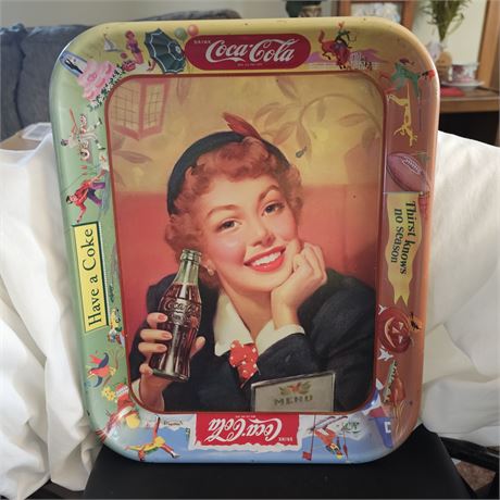 Coca-Cola metal serving tray, also known as the "Menu Girl" tray.