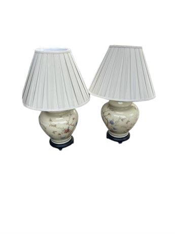 This is a pair of glass table lamps by designer Jenny Worrall, in the "Honeysuck