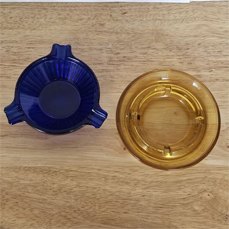 Colored glass ashtrays, cobalt blue & amber