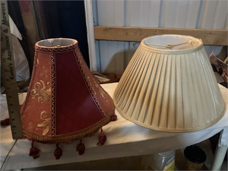 Two lampshades (one beige, one red/floral)