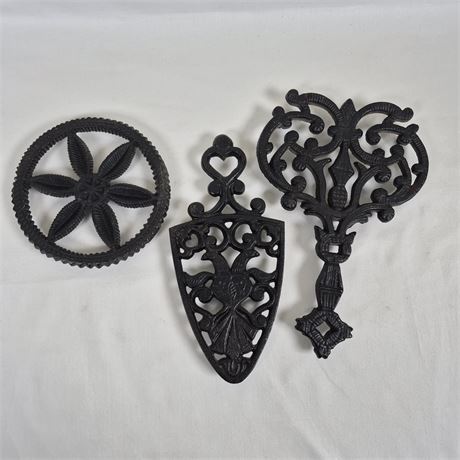 3 Vtg Cast Iron Trivets - Round, Sad Iron Shape & Uniq. Handled