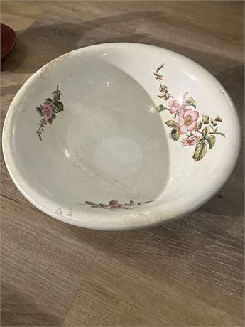 Vintage ceramic serving bowl, featuring the manufacturer's mark.
