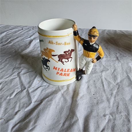 1960s  ceramic mug or stein featuring a jockey figure