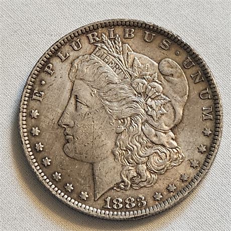 1883 O Morgan Silver Dollar.