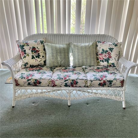 White Wicker Sofa with Seat Cushions and Pillows