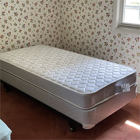 Twin Size Original Mattress Factory Mattress and Box Spring on Castered Frame