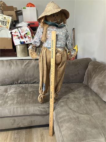 Primitive-style scarecrow doll.