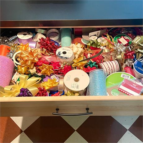 Drawer of Giftwrap Accessories with Ribbons and Bows