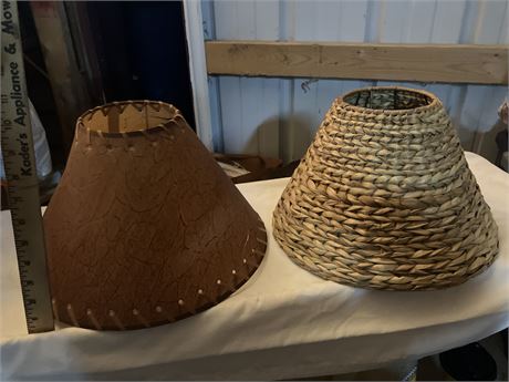 Pair of woven wicker and faux leather lampshades.