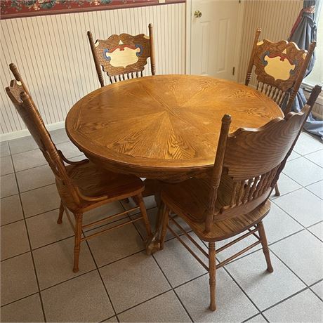 Oak Pedestal Kitchen Table with French Country Press Back Chairs
