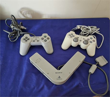 (2)~Playstation Controllers & 4 Person Multi-Tap for PS1
