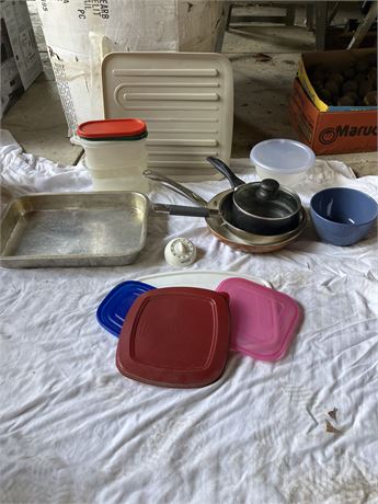 lot of miscellaneous kitchenware and food storage containers