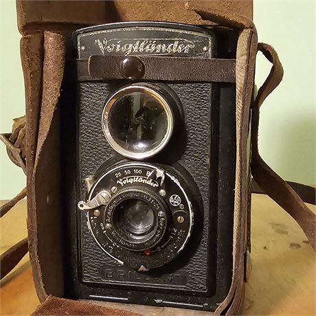 Voighander vintage camera with leather case