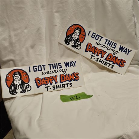 Vintage promotional stickers for "Daffy Dan's T-Shirts".
