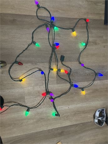 Old fashioned large bulb Christmas lights. Roughly 210 inches in length.