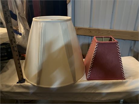 2 lampshades (one beige/larger, one red/with stitching)