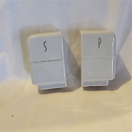 Pair of vintage white porcelain salt and pepper shakers