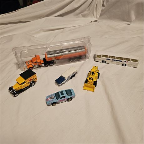 Assortment  of vintage die-cast toy vehicles