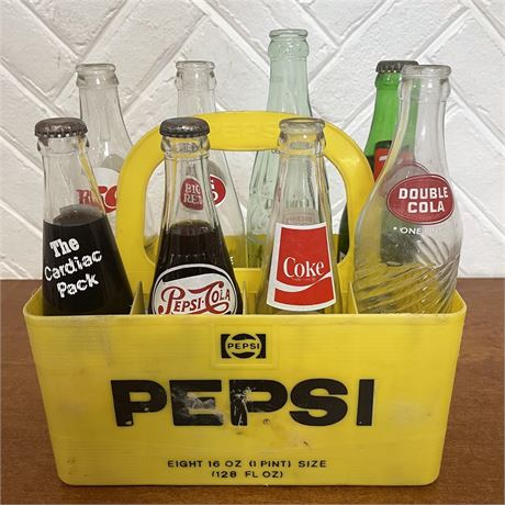 (8) Vintage Soda Bottles in Plastic Pepsi Carrier