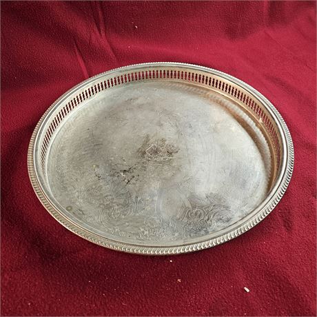vintage silver-plated round serving tray.