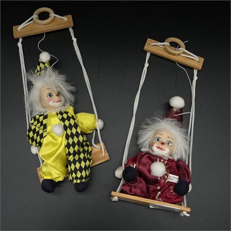 Pair of Collectable Slovenian Porcelain Face Clowns on Swings