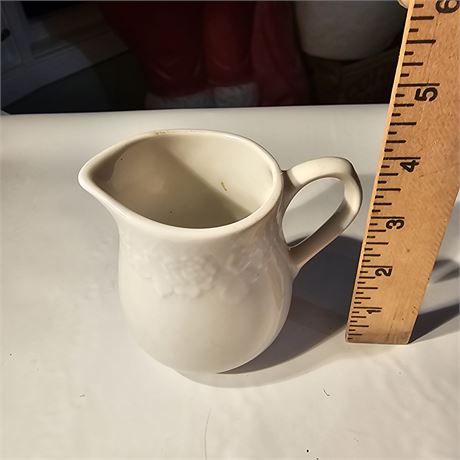 Gibson Designs embossed white creamer or small syrup pitcher.