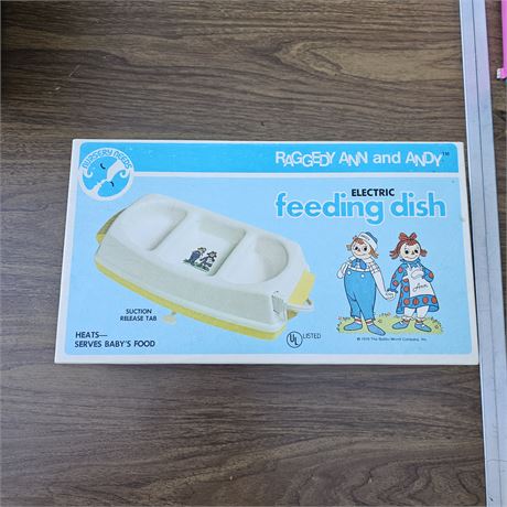 Vntage Raggedy Ann and Andy electric feeding dish.