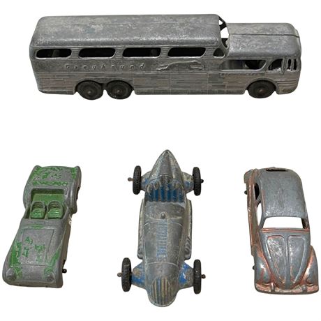 Vtg Tootsietoy Diecasts- Greyhound Bus, Triumph TR-3, Cockpit No3 & VW Beetle