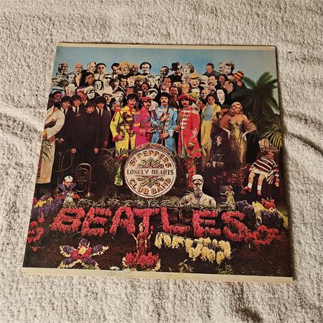 Vinyl record album of The Beatles' "Sgt. Pepper's Lonely Hearts Club Band".
