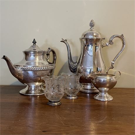 Pair of Teapots, Candle Holders and Creamer Dish